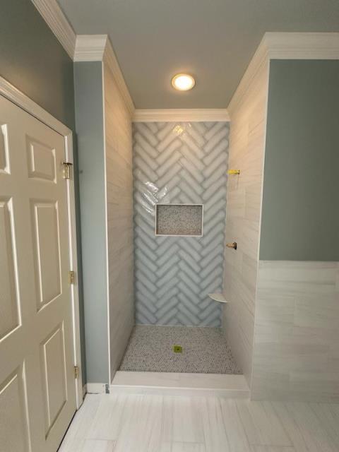 Installing tile in this master bath in Alpharetta, GA.