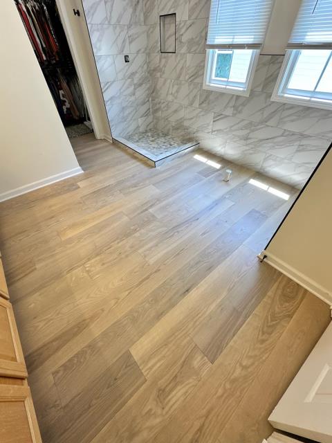 We installed engineered wood in primary bathroom in Fairburn, GA. 