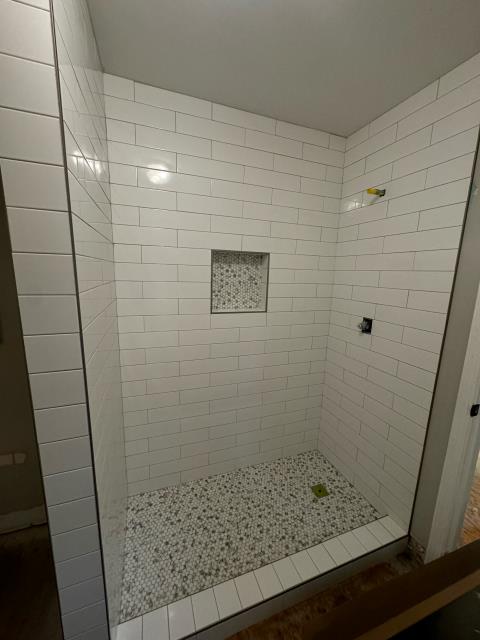 Installed 2 tile showers in bathrooms at a home in Acworth, GA. Installed 2 tile showers in bathrooms at a home in Acworth, GA.