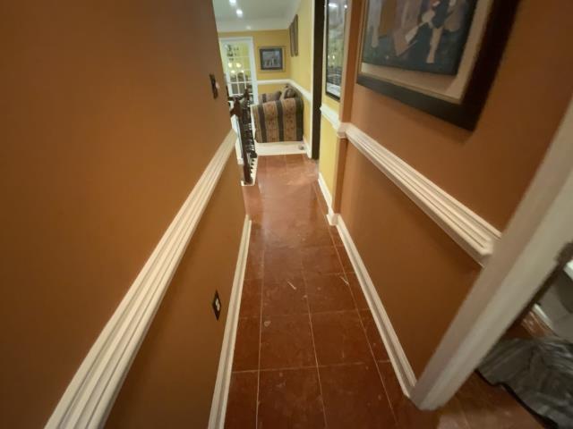 Demo carpet, tile, and wood to replace with a prefinished engineered wood floor in Fairburn, GA. 