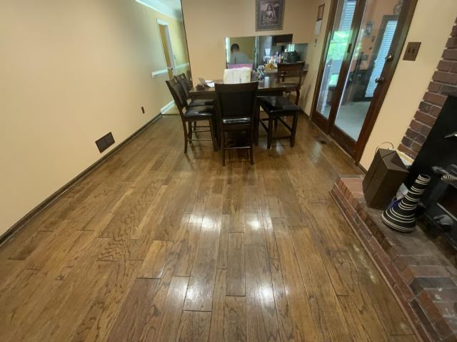 Demo carpet, tile, and wood to replace with a prefinished engineered wood floor in Fairburn, GA. 