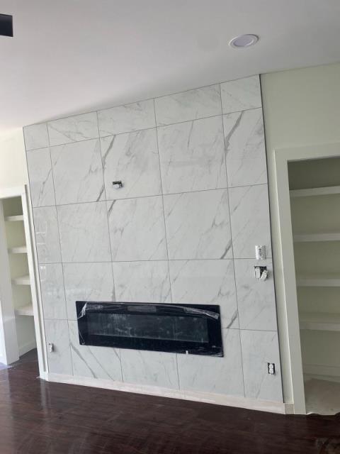 Tile install around fireplaces, at these townhomes in Avondale Estates, GA.