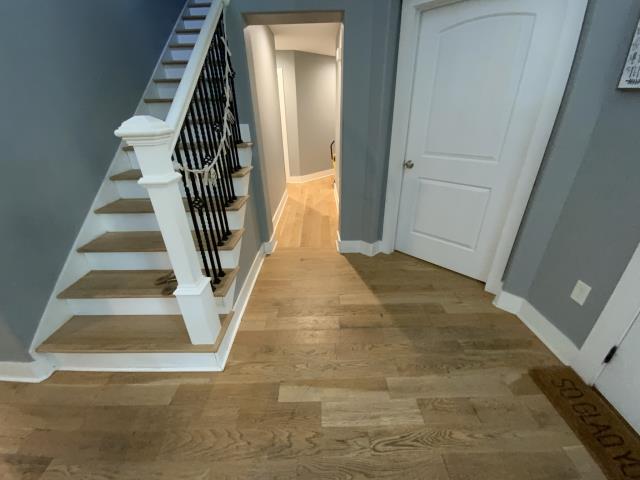 Replacing water damaged oak flooring. Sand and refinish entire main level. Powder Springs, Ga. 