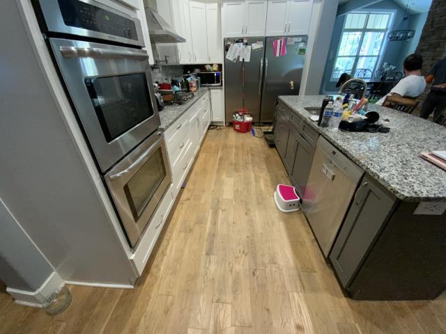 Replacing water damaged oak flooring. Sand and refinish entire main level. Powder Springs, Ga. 