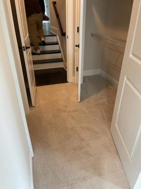 Installation of carpet throughout this home in Alpharetta, GA.