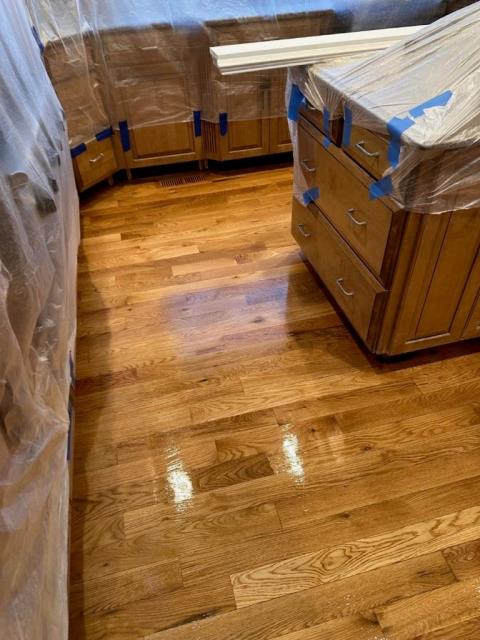 Installed additional white oak hardwood in this home in Duluth, GA and then sanded and finished the wood throughout the home. 