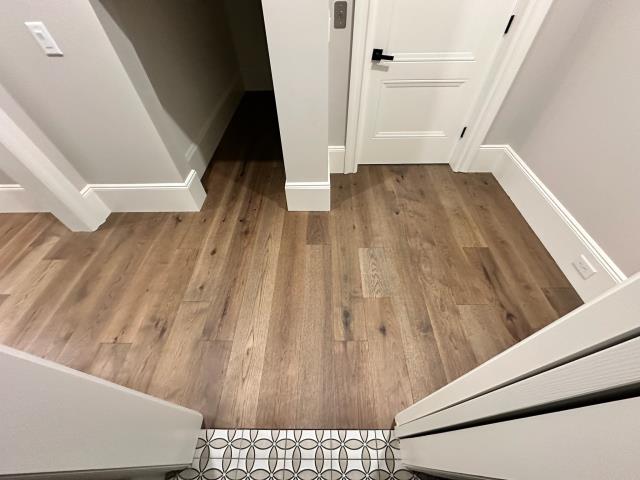 We installed glue down engineered pecan hardwood at this new home build in Winston, GA.