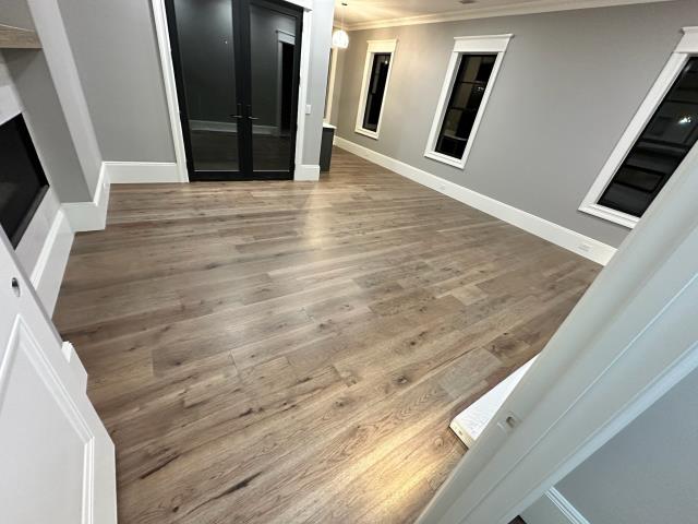 Installed new pecan engineered hardwood flooring in Winston, GA.