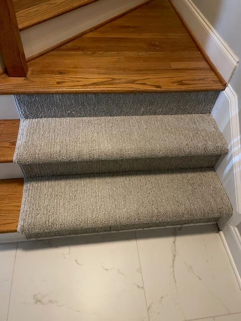 We recently completed a project in Atlanta, GA where we installed a beautiful pattern carpet running on solid oak wood stairs. We also installed the tile leading up to the stairs. 
We recently completed a project in Atlanta, GA where we installed a beautiful pattern carpet running on solid oak wood stairs. We also installed the tile leading up to the stairs.