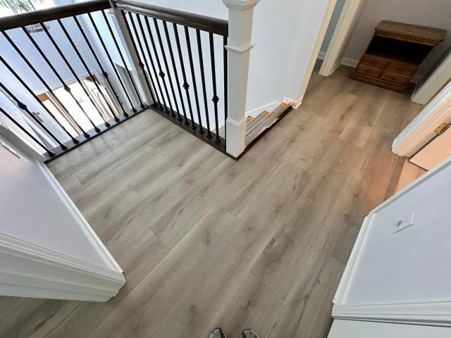 Loving this new click/lock luxury vinyl plank we installed in the upper level of this Dallas, GA home. 