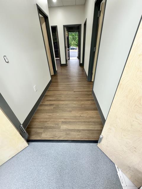 
I recently completed a flooring project for a commercial space. The previous flooring was concrete, but now it's been replaced with new LVP. The space needed some repairs and finishing touches, but will be open for business shortly. 