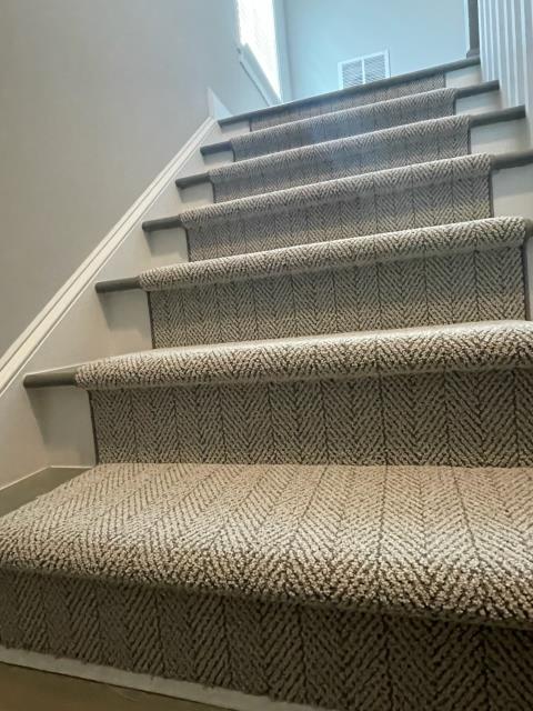 We installed a new carpet runner on these stairs at this Kennesaw, GA home yesterday after installing some new LVP last week.  We installed a new carpet runner on these stairs at this Kennesaw, GA home yesterday after installing some new LVP last week.