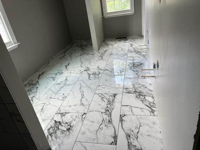 At this home in Bremen, GA we installed a new shower pan then tiled the bathroom floor, shower floor, and shower walls for this client and it turned out beautiful!