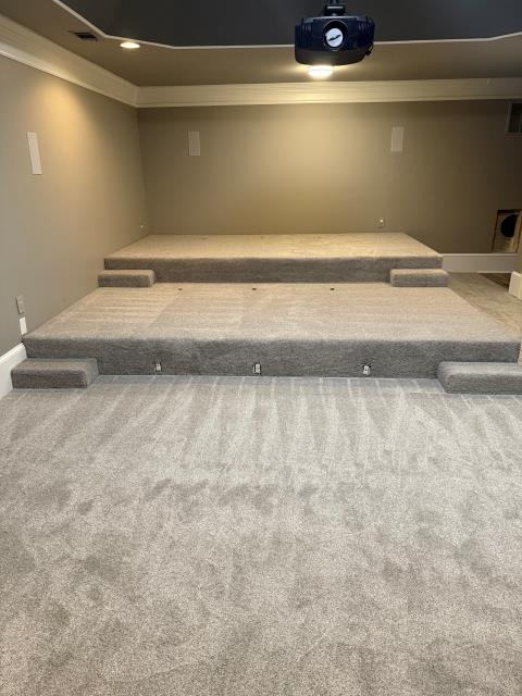 Last week in Douglasville, GA we installed new carpet and pad in this home theatre. 