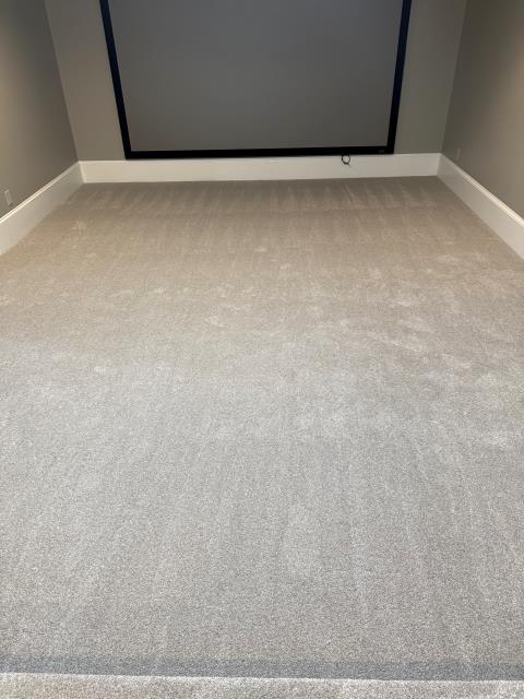 Last week in Douglasville, GA we installed new carpet and pad in this home theatre. 