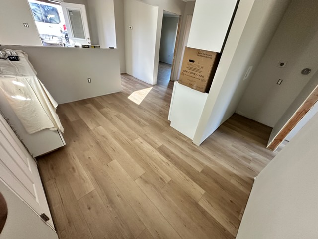 
We installed new LVP flooring in a Roopville home.