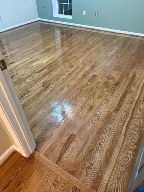 At this home in Villa Rica, GA we installed some new white oak solid hardwood. We then finished the new wood and refinished the existing wood to match giving the home a more cohesive feel. 