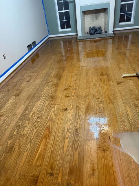 At this home in Villa Rica, GA we installed some new white oak solid hardwood. We then finished the new wood and refinished the existing wood to match giving the home a more cohesive feel. 