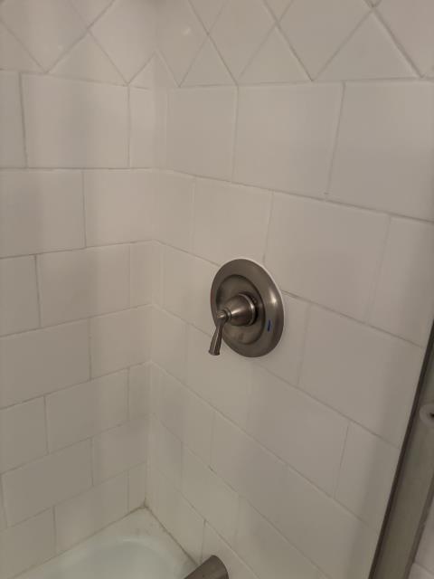 Replaced moen shower cartridge that was frozen open with new moen cartridge. Reassembled trim and sealed with caulking. No warranty, water pressure is too high. Measured water pressure at 87psi.