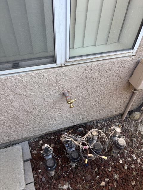 Rebuilt main riser to home with new 1 inch ball valve, double union pressure regulator, tee and hose bib. Reconnected to 3/4 inch irrigation supply. Set pressure to 65 psi. 1 year warranty on workmanship. Replaced 3/4 inch hose bib in backyard. 1 year warranty on workmanship.