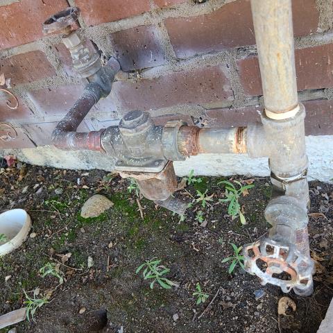 Installing customer-supplied fireplace. Set fire pit in the designated area and provided necessary materials to connect and ensure proper operation.
