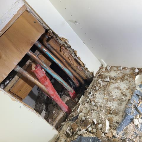 Call out to locate slab leak had to cut drywall underneath cabinet lo located a 1/2  hot water line leaking. Gave customer price to do repair he said his handyman will take care of it.