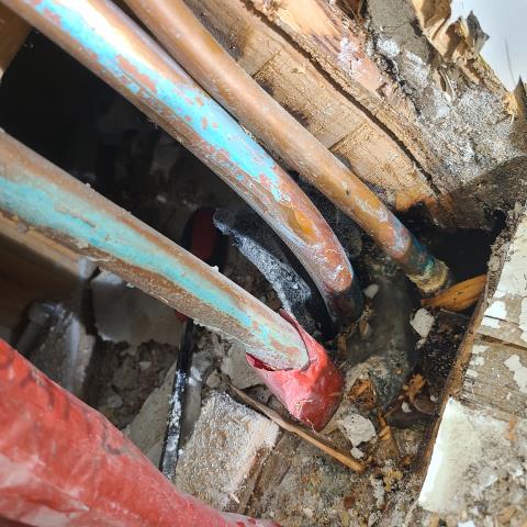 Call out to locate slab leak had to cut drywall underneath cabinet lo located a 1/2  hot water line leaking. Gave customer price to do repair he said his handyman will take care of it.