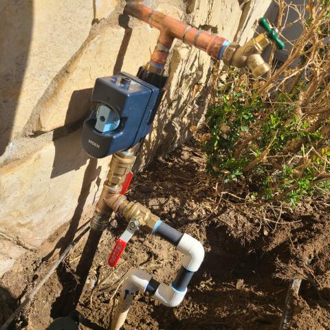 
I installed a Moen flow valve for a customer. I had to rework the water service riser and install two new shutoff valves. The irrigation waterline had to be installed before the Moen flow valve. The customer supplied the Moen flow valve and a three-quarter inch hose bib.