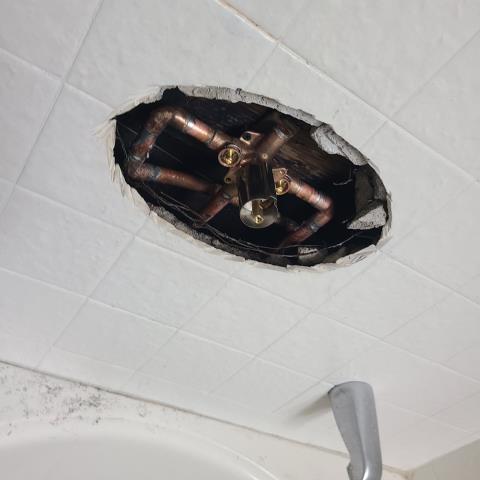 Rebuilt the main water shut-off and replaced the existing pressure regulator and gate valve with a new 1/4 turn ball valve. Rebuilt the riser and tested the system for leaks — everything is working properly with no leaks detected.

To install two retrofit Moen shower valves — one in the hallway bathroom and one in the master bathroom. We will need to cut into the tile to access and reconnect the existing water lines to the new shower valves. Additionally, we will replace the tub spout with diverter and install a new showerhead in one of the bathrooms.