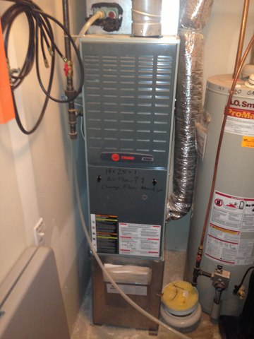 Furnace repair call. Trane furnace not working. Install new furnace blower motor. Install new blower wheel. Turn on system, and test. System running great. 