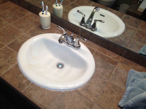 Plumbing repair call. Delta lavatory faucet leaking. Rebuild hot, and cold stems on bathroom faucet. 