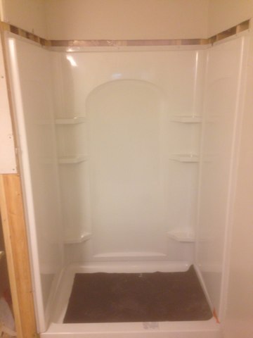 Plumbing repair call. Install new Kohler shower unit. 