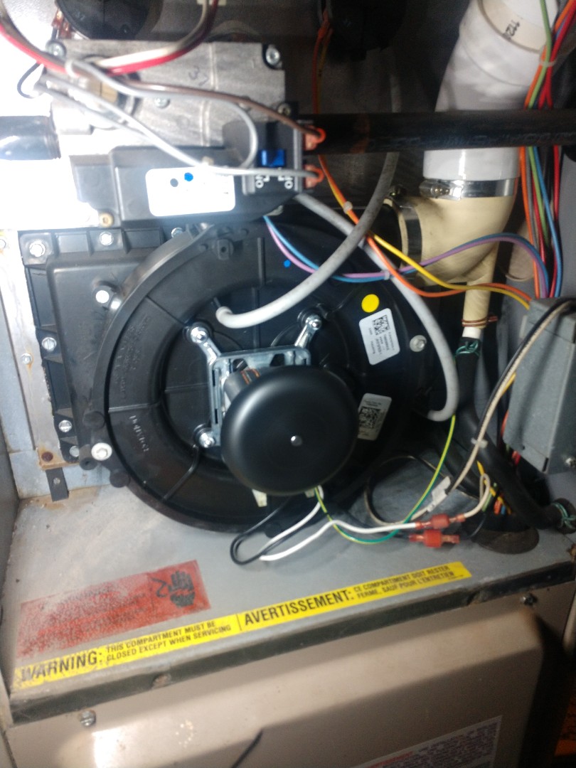 Replaced induced draft fan motor on high efficiency Amana furnace.