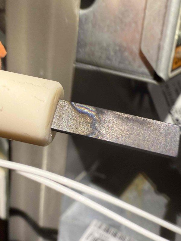 Completed scheduled MVP Heating maintenance service. Inspected heat exchanger components for proper operation, noted normal heat discoloration patterns on heat element surfaces. Examined structural support brackets and fasteners, confirming all components are secure with no signs of significant wear or deterioration.