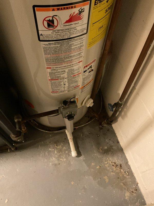 Responded to service call for no hot water. Upon inspection, found GE water heater with temperature setting issues. Adjusted thermostat and verified proper gas valve position. System now producing hot water normally.