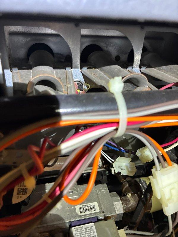Performed standard furnace tune-up including inspection of electrical connections and wiring. Examined junction points with wire nuts and verified secure connections. Inspected gas line connections and insulation at entry points to ensure proper sealing. All components functioning as designed with no issues identified.