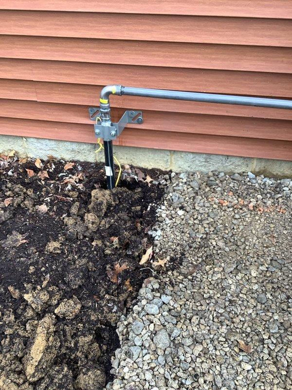 Successfully installed 28kW Next Gen Generac Generator with approximately 55' of underground gas line to existing meter. Completed gas line trenching, installation of piping with appropriate shut-off valve assembly, and secured all connections. Mounted generator 10' from electric meter, ensuring proper placement and connections according to manufacturer specifications.