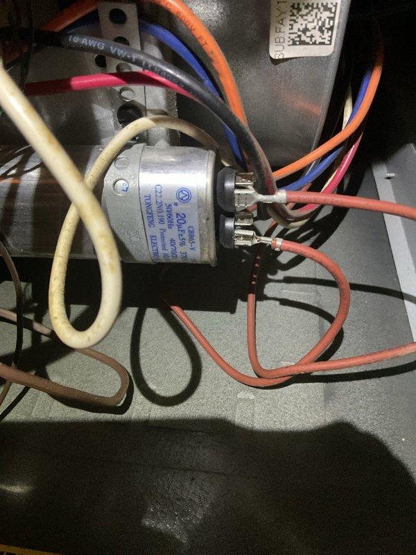 Performed routine heating maintenance service on a 9-year-old system. Inspected electrical components including wire connections, capacitor, and motor assembly. Examined blower motor and internal wiring harness for proper function and condition. All components operating within normal parameters at time of service.