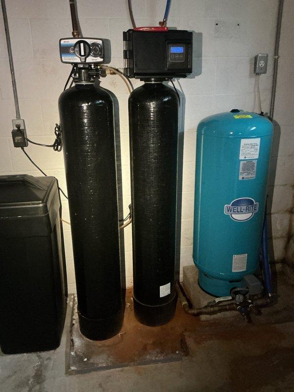 Responded to service call regarding broken pipes under kitchen sink. Discovered significant copper pipe deterioration with blue-green patina indicating advanced corrosion at connection points. Replaced corroded copper supply lines with new fixtures and addressed mineral buildup at pipe joints to prevent future leakage.