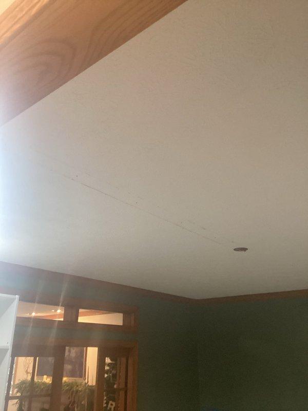 Successfully installed a ceiling fan with integrated light fixture in the center room, requiring drywall modification for proper mounting with a fan-rated electrical box. Additionally, installed two sconce lights on the wall between existing bookshelves and added a new electrical outlet below these fixtures, accessing wiring through the basement to minimize wall damage.