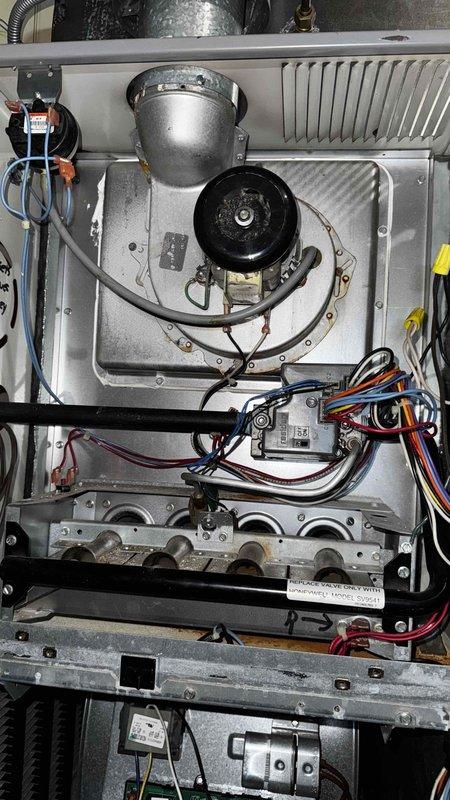Diagnosed and repaired furnace with continuous blower operation and no heat production. Inspection of control board revealed damaged relay causing blower to run constantly regardless of thermostat settings. Replaced faulty control board component and verified proper system cycling with appropriate heat output upon completion.