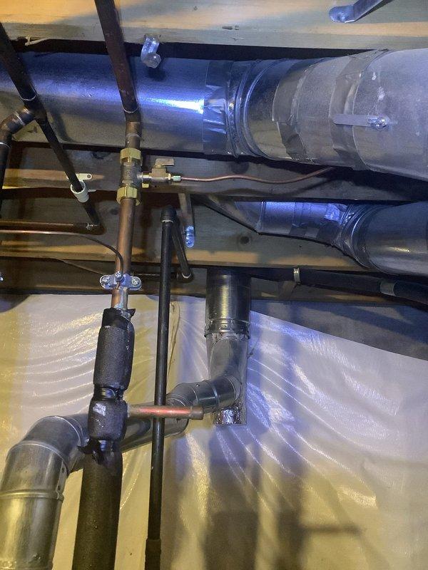 Returned to customer's residence to replace the inline water filter as scheduled. Successfully installed the new filter component connected to the existing plumbing system with proper copper pipe connections. The monitoring control unit with digital display is now operational and properly mounted, with all connections secure and system functioning as designed.