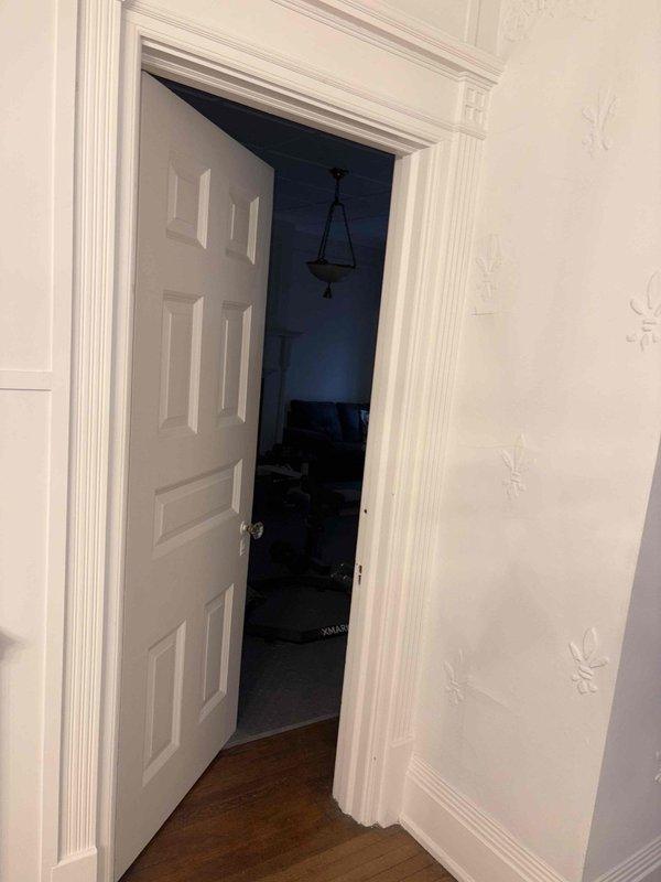 Conducted a comprehensive HVAC replacement estimate for a remodel project with no existing system currently in place. Assessment included evaluation of space requirements for new furnace, air conditioning unit, and complete ductwork installation in a residential interior with ornate trim work and hardwood flooring.