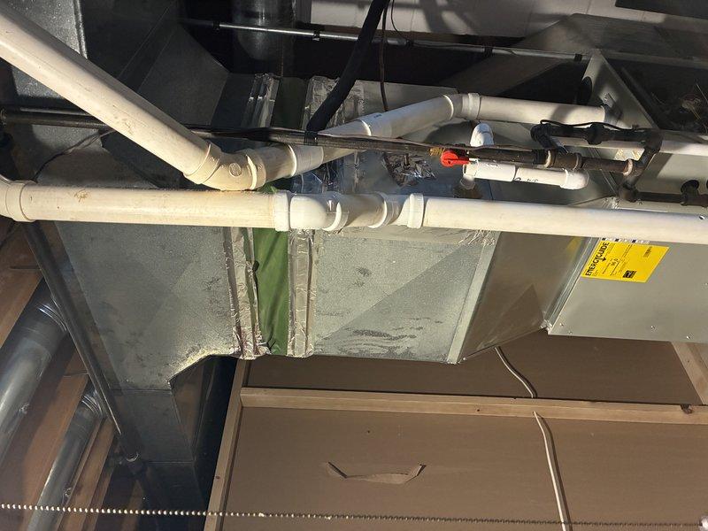 Completed scheduled tune-up on furnace to address uneven heating issue where basement was not receiving proper heat. Performed full inspection of system components including examination of internal control board, electrical connections, and PVC venting system. Adjusted airflow distribution to improve heat delivery to basement zone while ensuring proper overall system operation.