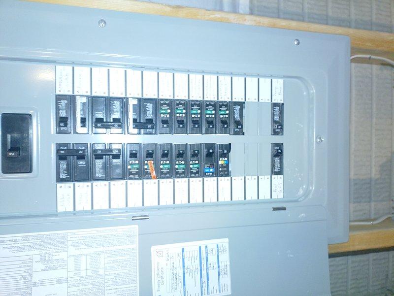 Replaced 5-6 electrical outlets in unfinished basement. Inspected main circuit breaker panel to ensure proper connection and functionality. Work area had exposed framing and temporary ceiling covering, requiring careful installation to maintain electrical code compliance.