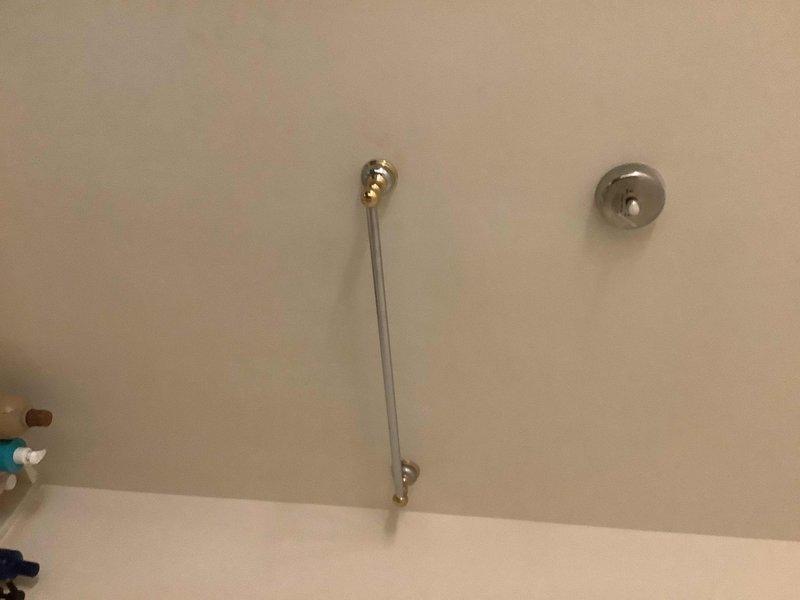 Inspected and repaired leaking shower head in upstairs bathroom, addressing visible water accumulation in bathtub. Additionally, identified and fixed leak under bathroom sink, ensuring all plumbing fixtures were properly sealed and functioning correctly.