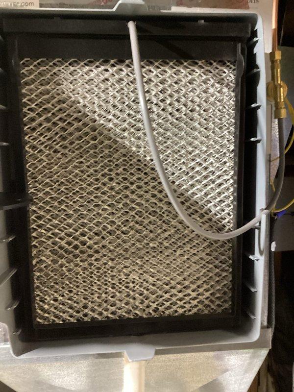 Performed scheduled MVP Heating maintenance service. Inspected and replaced humidifier filter component with new pleated filter (model #413). System now operating properly with clean filtration media installed.