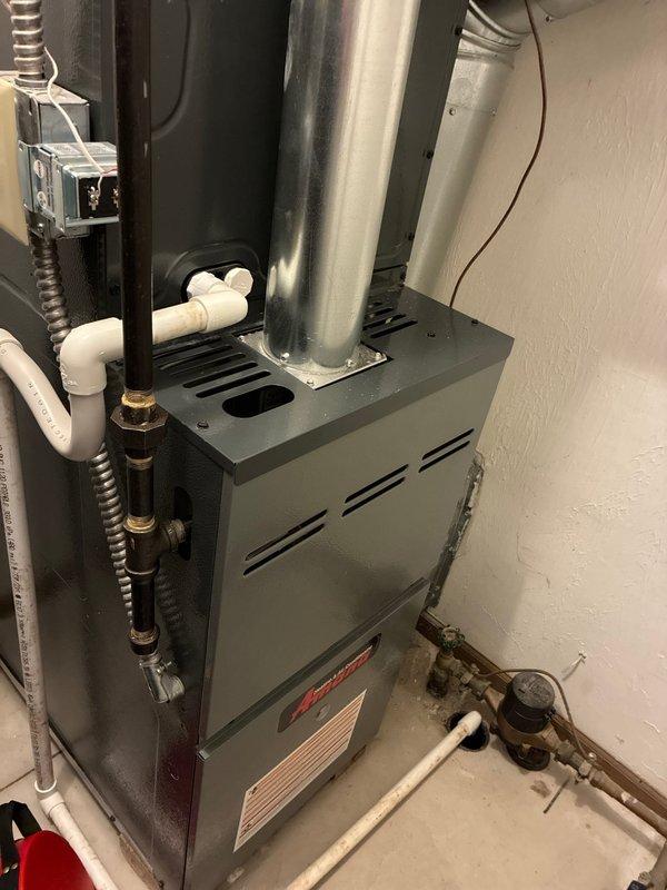 Performed scheduled MVP maintenance on residential gas furnace. Inspected heating system components including control board wiring connections, exhaust venting, and condensate drainage system. All systems verified operational with no issues detected.