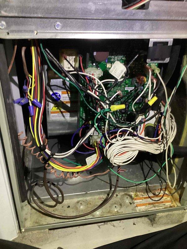 Performed preventative maintenance on 11-year-old gas furnace with MVP motor. Inspected blower motor assembly, control board connections, and electrical components. All systems functioning normally with no visible issues detected.
