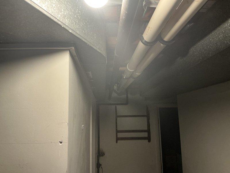 Performed site assessment of existing HVAC system, including a Carrier furnace and associated ductwork in utility room. Documented current equipment condition, evaluated existing insulated ductwork configuration, and inspected plumbing infrastructure connections to prepare comprehensive replacement estimate.